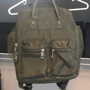 Mini dark green backpack